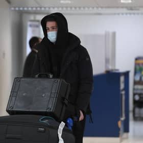 Central defender Jack Simpson arrives at Glasgow Airport on Monday before completing his move from Bournemouth to Rangers.  (Photo by Ross MacDonald / SNS Group)