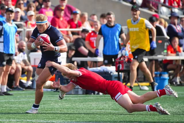 Two-try Dylan Richardson
of Scotland tries to break free in the first half against Canada in Ottawa. (Photo by Chris Tanouye/Getty Images for Scottish Rugby)