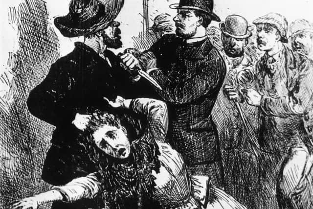 1889:  A fanciful engraving showing Jack The Ripper being caught red-handed, grasping one of his victims by the hair and holding a knife. Illustrated Police News 1889