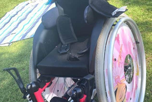 The child’s wheelchair is described as 'distinctive' as it has pink princess wheels and ballerina stickers on it (Photo: Police Scotland).