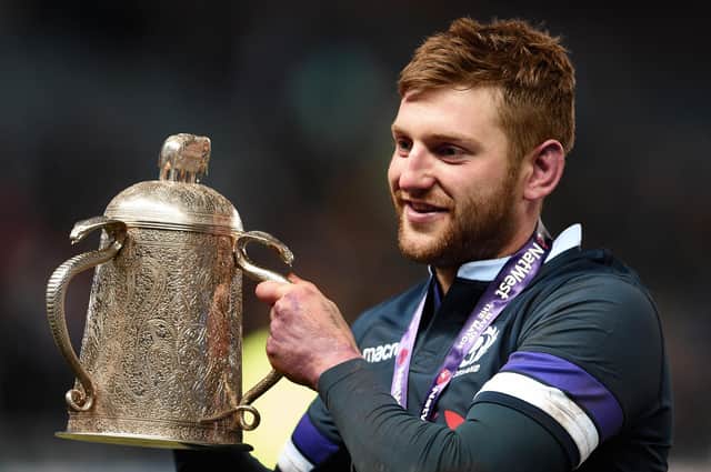 Finn Russell celebrates with the Calcutta Cup after Scotland's win over England at BT Murrayfield in 2018. Picture: Ian Rutherford/PA Wire