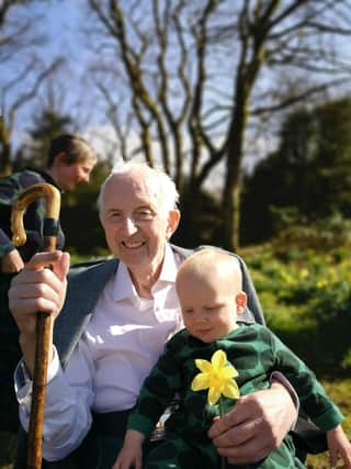 Hew Hamilton with his grandson Magnus at Crosswoodhill Farm