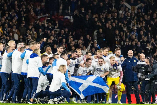 The Scotland squad celebrate qualifying for Euro 2024 after full-time against Norway on Sunday night (Photo by Alan Harvey / SNS Group)