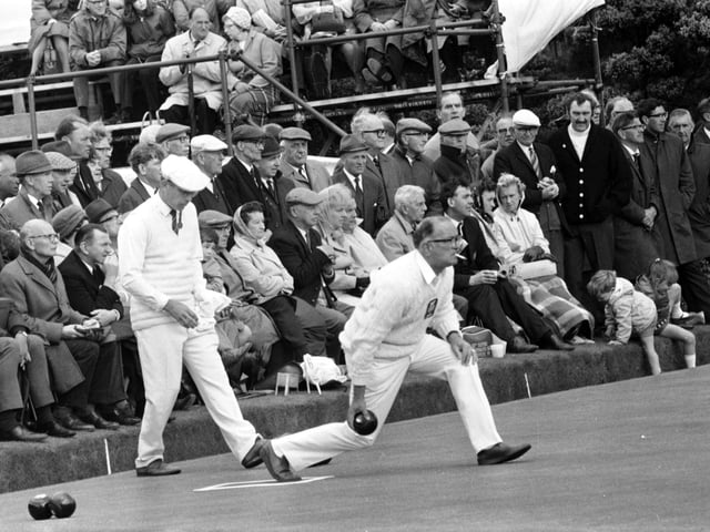 Scotland bowls team member Bob Motroni and England's David Bryant on the green during the Commonwealth Games at Balgreen bowling club, Edinburgh, in July 1970.