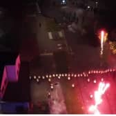 Police officers are targeted with fireworks in Niddrie, Edinburgh, during chaotic scenes on Bonfire Night