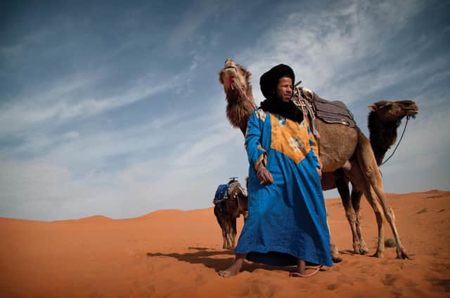 A camel guide in the Sahara desert. PIC: G Adventures