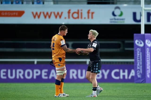 Bastien Chalureau of Montpellier shakes hands with Glasgow's Sam Johnson of Glasgow Warriors. Picture: Alex Caparros/Getty Images for EPCR