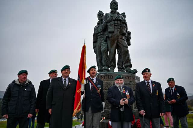 A small number of serving and former Royal Marine Commandos gather at Commando Memorial at Spean Bridge to commemorate and pay respect to the sacrifice of service men and women who fought in the two World Wars and subsequent conflicts (Photo by Jeff J Mitchell/Getty Images)
