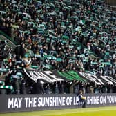 Hibs fans sing 'Sunshine on Leith' in tribute to late chairman Ron Gordon ahead of the match against Rangers at Easter Road. (Photo by Alan Harvey / SNS Group)