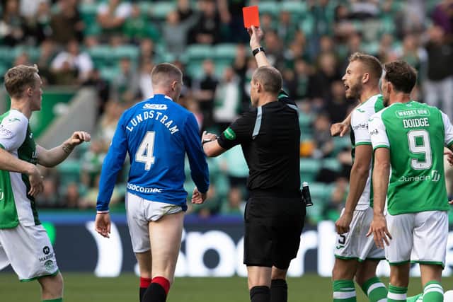 Willie Collum shows a red card to Rangers midfielder John Lundstram. (Photo by Alan Harvey / SNS Group)