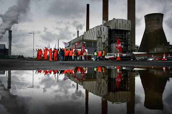 Workers picket during a past strike at the Grangemouth oil refinery. Picture: Jeff J Mitchell/Getty Images