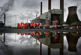 Workers picket during a past strike at the Grangemouth oil refinery. Picture: Jeff J Mitchell/Getty Images