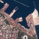 This satellite photo provided by Planet Labs PBC shows the Sierra Leone-flagged cargo ship Razoni, center with white masts, docked at the port in Odesa, Ukraine. Picture: Planet Labs PBC via AP
