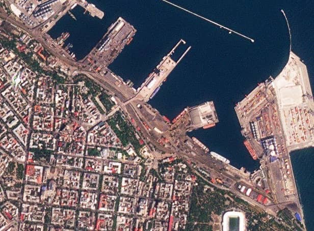 This satellite photo provided by Planet Labs PBC shows the Sierra Leone-flagged cargo ship Razoni, center with white masts, docked at the port in Odesa, Ukraine. Picture: Planet Labs PBC via AP