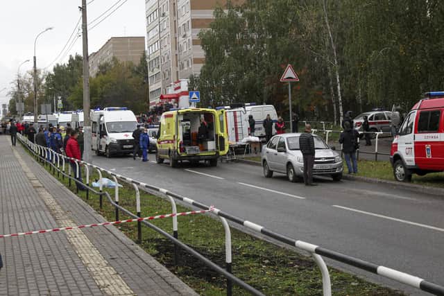 Police and paramedics work at the scene of a shooting at school No. 88 in Izhevsk, Russia. Picture: AP Photo
