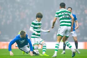 John Lundstram put in a hefty challenge on Kyogo Furuhashi early on in the Scottish Cup semi-final between Rangers and Celtic. (Photo by Craig Foy / SNS Group)