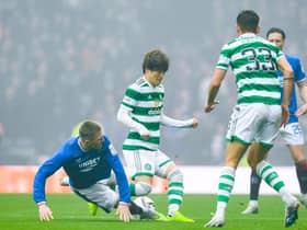 John Lundstram put in a hefty challenge on Kyogo Furuhashi early on in the Scottish Cup semi-final between Rangers and Celtic. (Photo by Craig Foy / SNS Group)