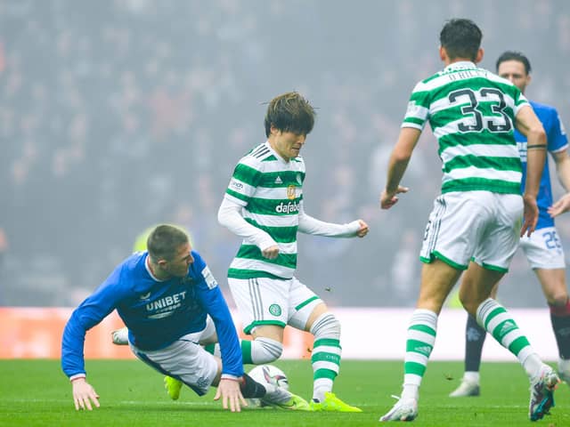 John Lundstram put in a hefty challenge on Kyogo Furuhashi early on in the Scottish Cup semi-final between Rangers and Celtic. (Photo by Craig Foy / SNS Group)