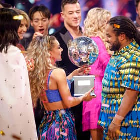 Hamza Yassin and Jowita Przystal with their trophy after winning Strictly Come Dancing 2022