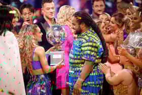 Hamza Yassin and Jowita Przystal with their trophy after winning Strictly Come Dancing 2022