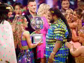 Hamza Yassin and Jowita Przystal with their trophy after winning Strictly Come Dancing 2022