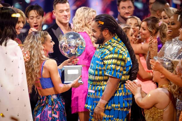 Hamza Yassin and Jowita Przystal with their trophy after winning Strictly Come Dancing 2022