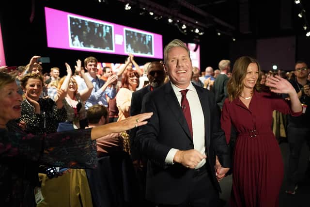 Labour Party leader Sir Keir Starmer, with his wife Victoria, leaves the stage after giving his keynote address during the Labour Party Conference at the ACC Liverpool. Picture: Stefan Rousseau/PA Wire