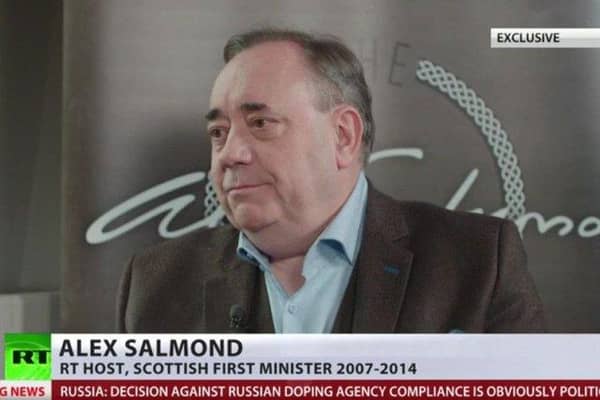 Alex Salmond has been urged to quit his RT chat show.
