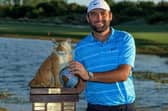 Scottie Scheffler poses with the Hero World Challenge Trophy after his win at Albany Golf Course in Nassau. Picture: TGR Live.