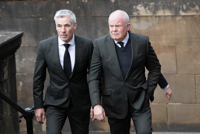 Celtic FC kitmen Hughie Hoolighan and Steve Wright arrive at the funeral of Rangers kitman Jimmy Bell