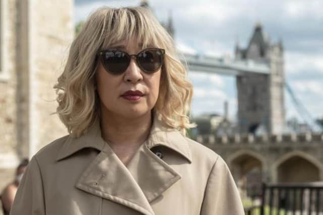 Sandra Oh goes undercover in a blonde wig. Photo: Sid Gentle Films / BBC.