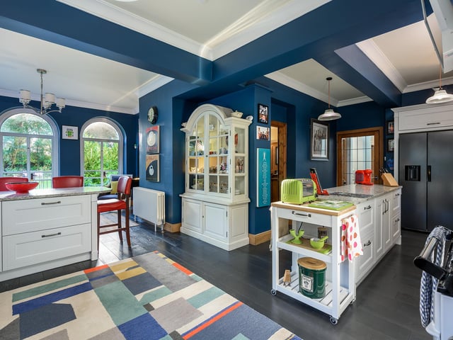 The lighting in the house was overhauled too, with the addition of chandeliers in the hall and kitchen.
The owner says: “We also considered the way natural light was coming in to the house and replaced all the doors to the central hall with bespoke glass doors modelled on the inner front door, to make sure everything was in keeping. The wood matches, as does the leaded glazing.”