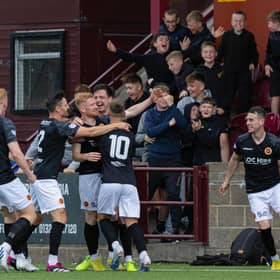 Stenhousemuir players and fans celebrate after Euan O'Reilly scores against St Johnstone. (Photo by Craig Foy / SNS Group)