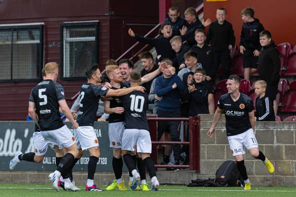 Stenhousemuir players and fans celebrate after Euan O'Reilly scores against St Johnstone. (Photo by Craig Foy / SNS Group)
