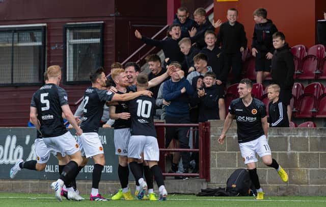 Stenhousemuir players and fans celebrate after Euan O'Reilly scores against St Johnstone. (Photo by Craig Foy / SNS Group)