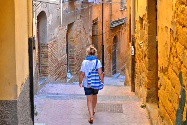 A back street in Venice, away from the crowds. Travellers are expected to revisit old haunts.