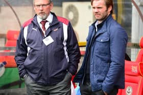 Former Hearts manager Craig Levein (left) and current manager Robbie Neilson.