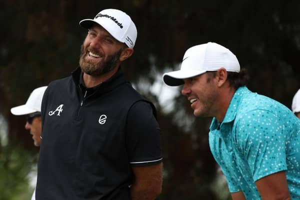 Dustin Johnson and Brooks Koepka wait on the 11th tee during a practice round for the 123rd US Open at The Los Angeles Country Club. Picture: Harry How/Getty Images.