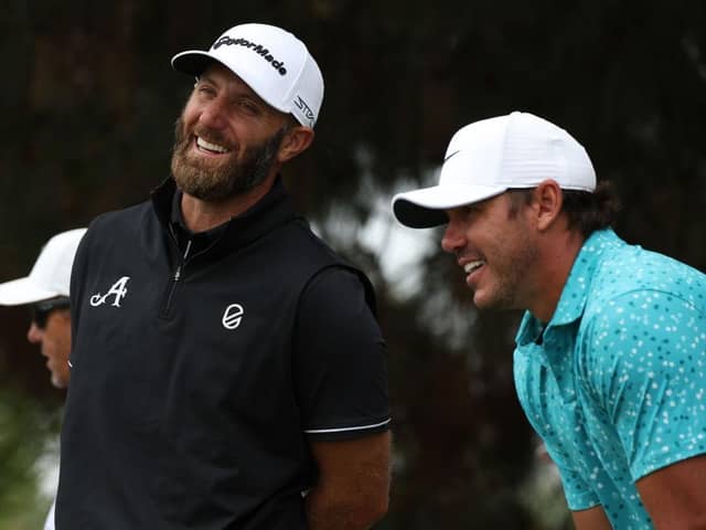 Dustin Johnson and Brooks Koepka wait on the 11th tee during a practice round for the 123rd US Open at The Los Angeles Country Club. Picture: Harry How/Getty Images.