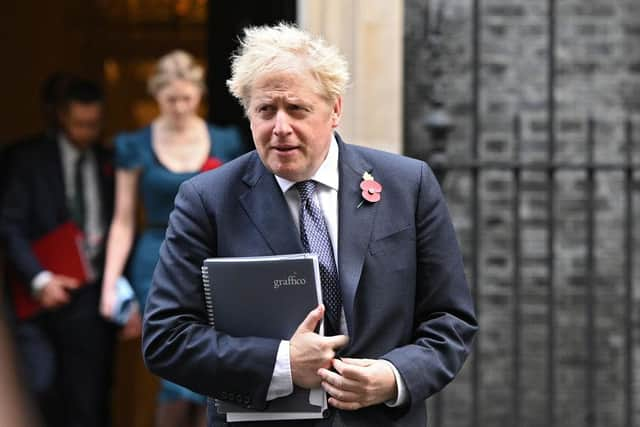 Boris Johnson leaves number 10, Downing Street as he heads to the weekly Cabinet meeting