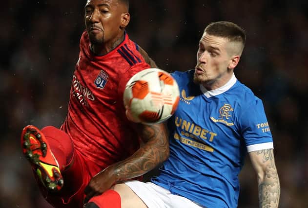 Jerome Boateng of Lyon vies with Ryan Kent of Rangers during the first meeting of the sides in September. (Photo by Ian MacNicol/Getty Images)