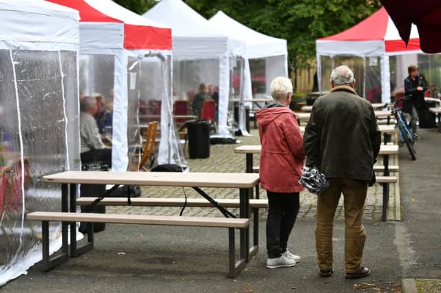 Many pubs and restaurants have provided a degree of shelter for customers in car parks and beer gardens (Picture: John Devlin)