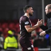 Hearts manager Robbie Neilson and Robert Snodgrass celebrate the win over Hamilton.