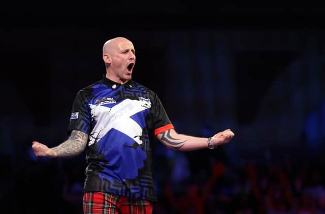 Alan Soutar of Scotland reacts during his Third Round Match against José de Sousa of Portugal during Day Twelve of The William Hill World Darts Championship at Alexandra Palace on December 29, 2021 in London, England. (Photo by Luke Walker/Getty Images)