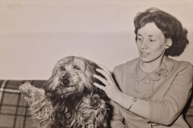 Bobby the Skye Terrier, who played Greyfriars Bobby in the 1960s Disney telling of the story of friendship and loyalty, with Jean Turner, who cared for the dog with her husband John at their Morningside home for more than a decade. Bobby's lost grave has now been found on an overgrown site in Lanarkshire with plans to have him reinterred at Greyfriars Kirkyard in Edinburgh with the original Bobby. PIC: Contributed.