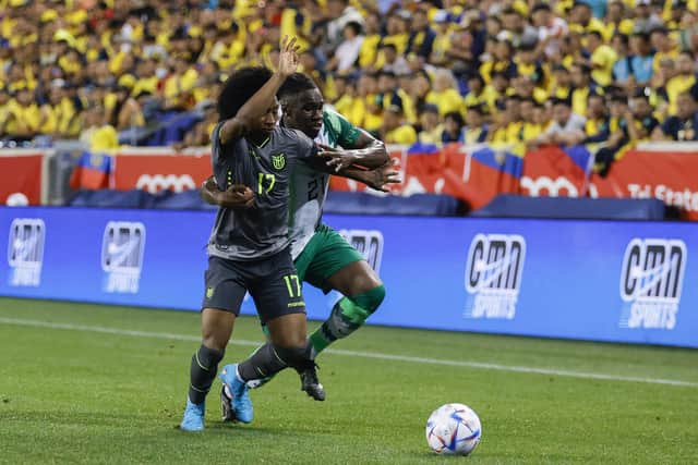 Rangers' Nigerian international defender Calvin Bassey (right) tussles with Ecuador's Angelo Preciado during the friendly international in New Jersey on June 2. (Photo by Tim Nwachukwu/Getty Images)