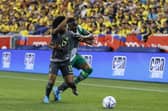 Rangers' Nigerian international defender Calvin Bassey (right) tussles with Ecuador's Angelo Preciado during the friendly international in New Jersey on June 2.  (Photo by Tim Nwachukwu/Getty Images)