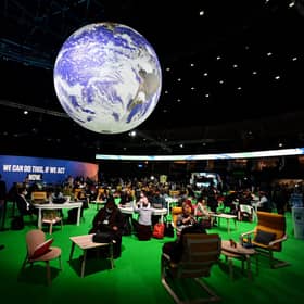 Delegates in the action zone at COP26 in Gasgow. Two years on, Scots are having an impacat at COP28 in Dubai (Picture:Paul Ellis/AFP via Getty Images)