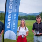 Bothwell Castle's Brodie Cunningham and Summer Elliott (Inverness) show off their prizes for being the main winners in the Barrie Douglas Scottish Junior Masters at Strathmore along with boys' under-18 winner Dylan Cairns (Royal Troon). Picture: Martin Cairns