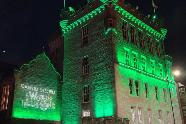 Camera Obscura lit up in green